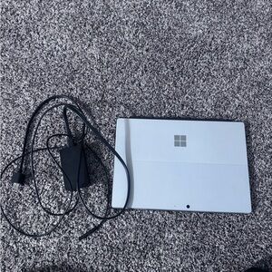 Microsoft Surface Pro 7 tablet in Silver with charger & keyboard